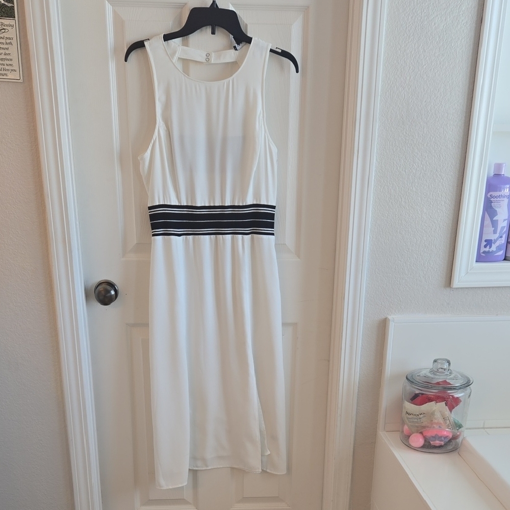 Elegant White Sleeveless Dress with Black Accents